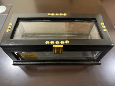 Wooden box with acrylic cover. INV